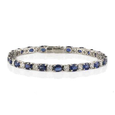 <p>18k White Gold Diamond and Sapphire Line Bracelet</p>
