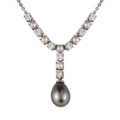 <p>18k White Gold Diamond and Pearl Necklace</p>
