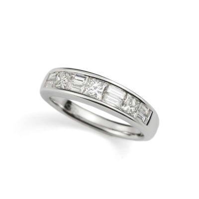<p>18k White Gold Princess and Baguette Cut Diamond Half Eternity Ring 1.15ct</p>
