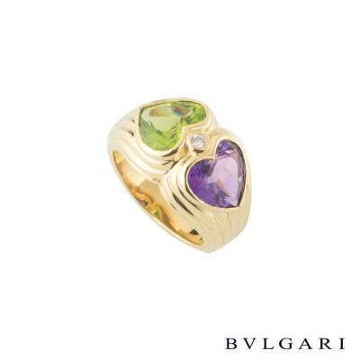<p>Bvlgari Doppio Peridot and Amethyst Ring</p>
