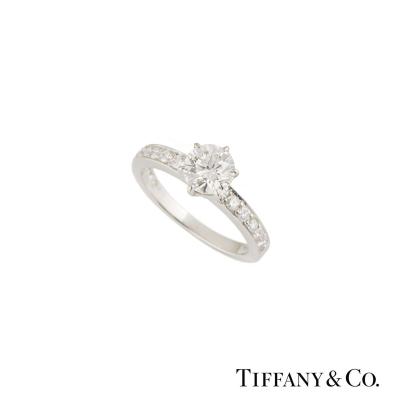 <p>Tiffany & Co. The Tiffany Setting with Diamond Band Ring 0.75ct F/VS1</p>
