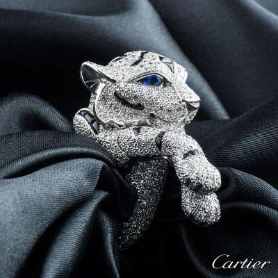 <p>Cartier Platinum Diamond, Sapphire and Onyx Panthere Ring</p>
