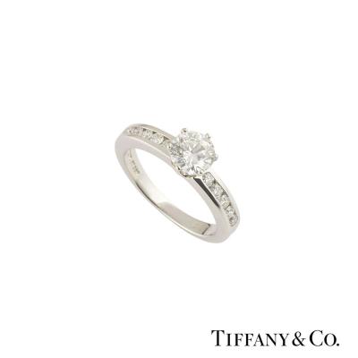 <p>Tiffany & Co. The Tiffany Setting with Diamond Band Ring 0.76ct G/VS1</p>
