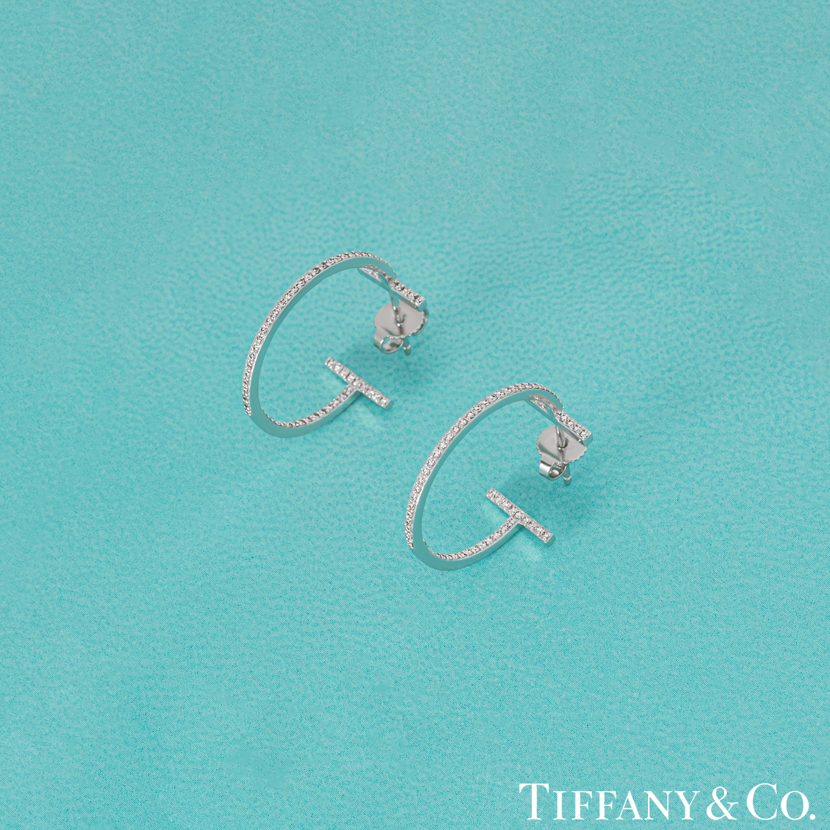 Tiffany & Co. White Gold Diamond Tiffany T Hoop Earrings | Rich Diamonds