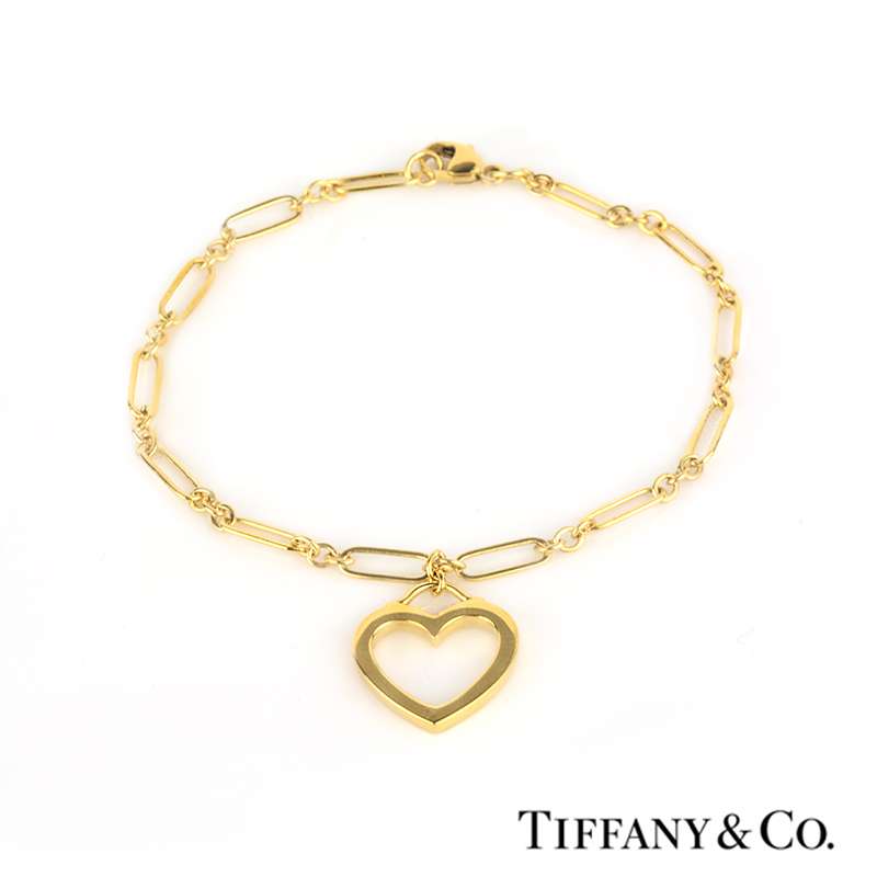 Tiffany & Co Bracelet With Heart Lock and Disc Charm in Yellow Gold