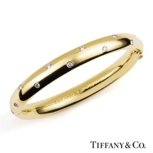 Tiffany & Co. 18k Yellow Gold Etoile Diamond Hinged Bangle