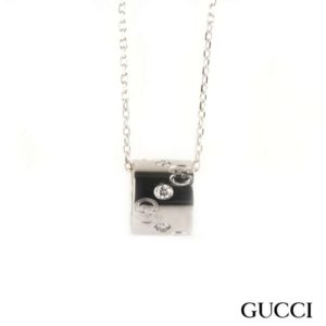 Gucci 18k White Gold Twirl Diamond Set Pendant.